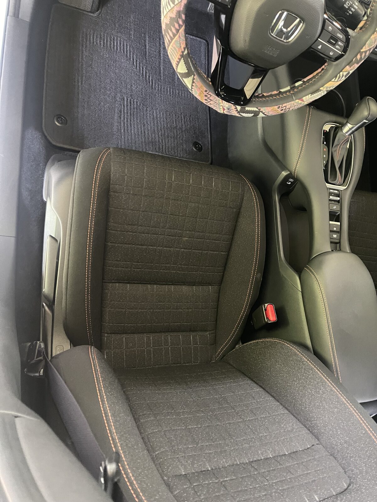 Honda passenger seat freshly vacuumed and detailed